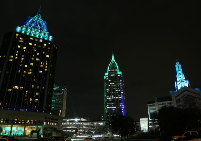 The RSA Tower in Mobile is lit in teal for cervical cancer awareness on Jan. 17, 2019.