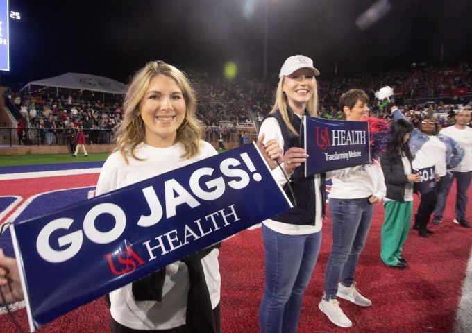 USA Health employees cheer on the Jags at Game Day