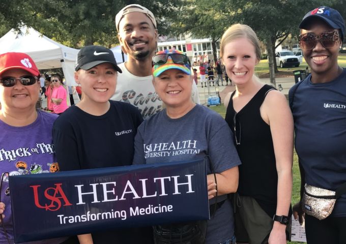 USA Health employees helped raise funds to fight heart disease and stroke at the 2019 Mobile Heart Walk.